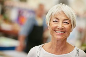 older woman smiling with healthy teeth