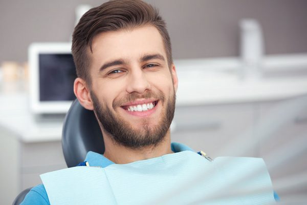 A smiling man - Dental Implants in Stirling